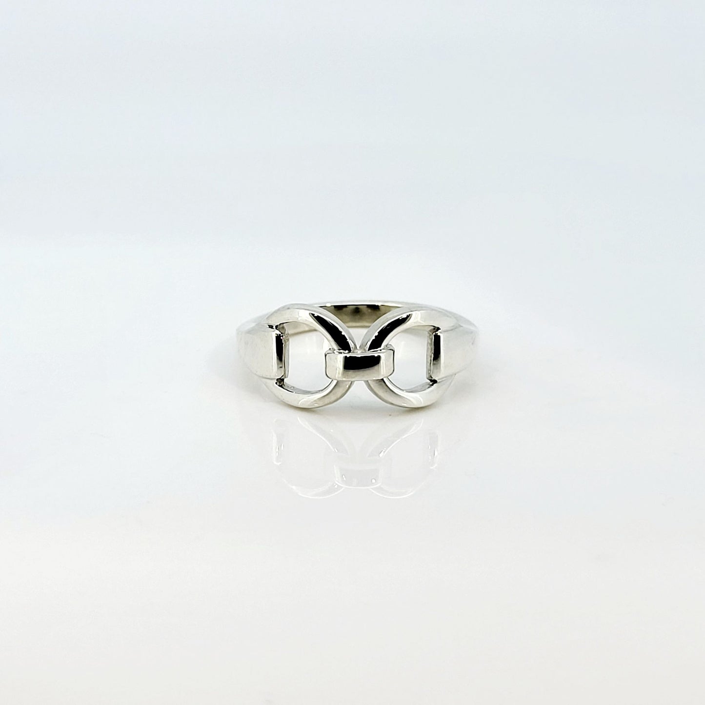 Product shop photo of a silver horse bit snaffle ring. Made by Crawford Hill Equestrian Jewellery. 